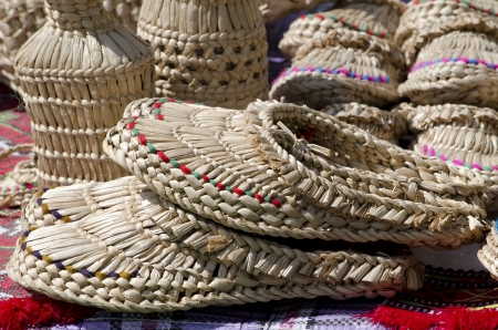 Bast shoes lying on the tableの写真素材
