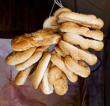 Ligament of delicious fresh pretzels with sesame seeds