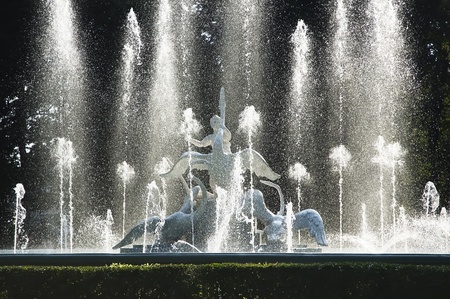 Fountain, decorated with a sculpture - a boy and a swansの写真素材