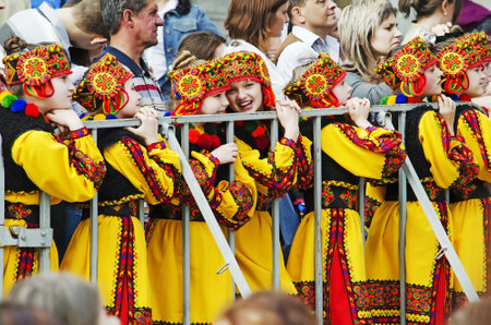 LVIV, UKRAINE - MAY 04, 2012: May 4th celebration was celebration of the Lviv city. On photo unknown Amateur ensemble, waiting for their turn to dance on stage.のeditorial素材