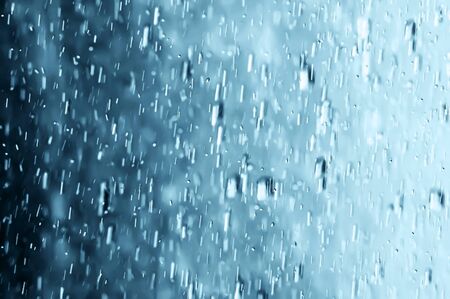 Drops in motion outside windows