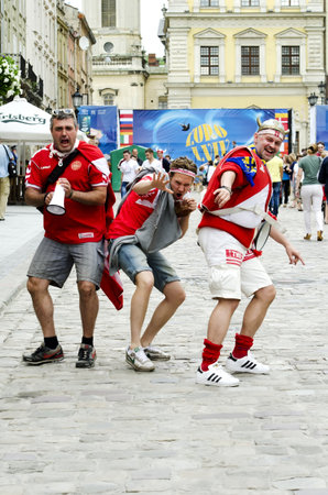 LVIV, UKRAINE - JUNE 13:  Denmark football fans in the center of the Lvov city, before the match Denmark- Portugal on June 13, 2012 in Lviv, Ukraine.のeditorial素材
