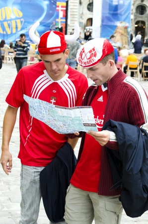 LVIV, UKRAINE - JUNE 13:  Denmark football fans in the center of the Lvov city, before the match Denmark- Portugal on June 13, 2012 in Lviv, Ukraine.のeditorial素材