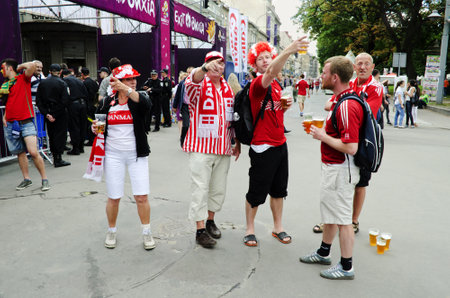 LVIV, UKRAINE - JUNE 13:  Denmark football fans in the center of the Lvov city, before the match Denmark- Portugal on June 13, 2012 in Lviv, Ukraine.のeditorial素材