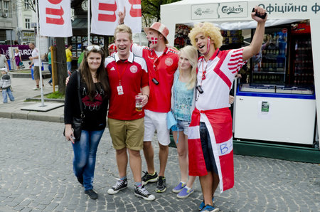 LVIV, UKRAINE - JUNE 13:  Denmark football fans in the center of the Lvov city, before the match Denmark- Portugal on June 13, 2012 in Lviv, Ukraine.のeditorial素材