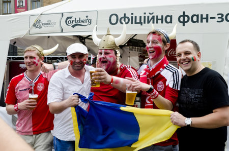 LVIV, UKRAINE - JUNE 13:  Denmark football fans in the center of the Lvov city, before the match Denmark- Portugal on June 13, 2012 in Lviv, Ukraine.のeditorial素材