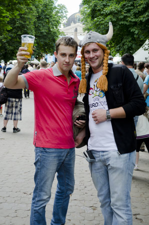 LVIV, UKRAINE - JUNE 13:  Denmark football fans in the center of the Lvov city, before the match Denmark- Portugal on June 13, 2012 in Lviv, Ukraine.のeditorial素材