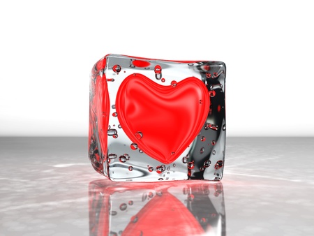 Red heart frozen in ice, isolated over whiteの写真素材