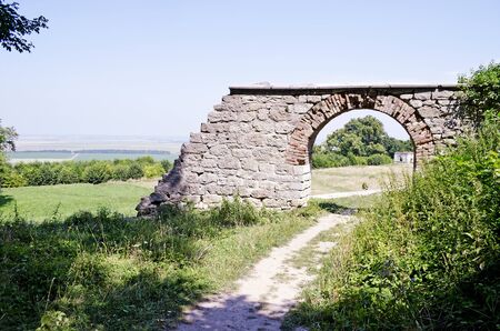 Landscape area through the stone gates  Pidhirtsi Castle, near Lviv, Ukraine  Time of construction...
