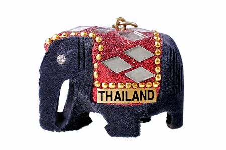 Black elephant - Traditional souvenir from Thailand, isolated over whiteの写真素材