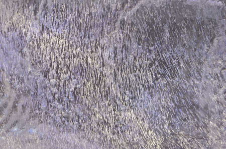 Abstract background - texture surface of ice blocks to the lightの写真素材