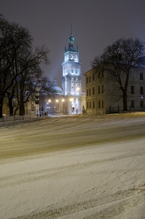 Beautiful winter cityscape at the night - Assumption Church in Lvovの写真素材