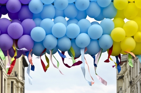 Colorful balloons closeup with developing colorful ribbons の写真素材