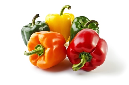 Five colorful peppers close-up, isolated on a white backgroundの写真素材