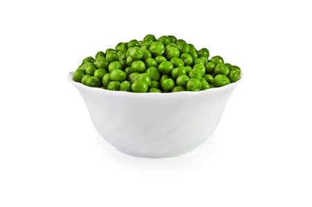 Green peas in a salad bowl isolated on a white backgroundの写真素材