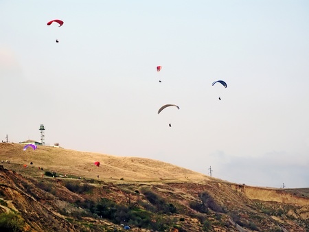 Several paragliders in the sky in Crimea. Koktebel, Ukraineの写真素材