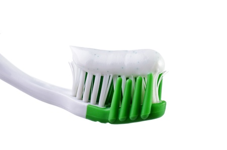 Toothbrush with toothpaste close-up isolated on a white backgroundの写真素材
