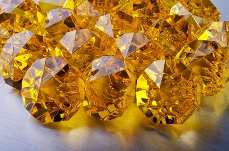 Many beautiful yellow gemstone close-upの写真素材