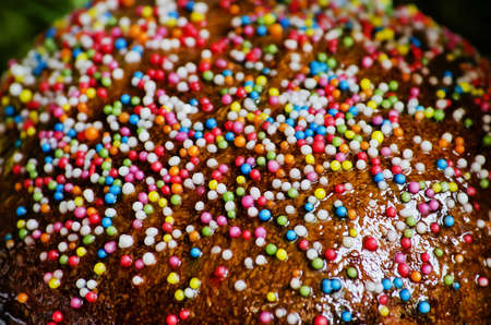 Colorful sweet powder on Easter cake close-upの写真素材