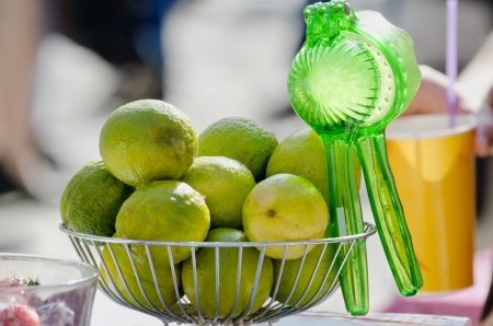Appetizing lime in the basket close-up