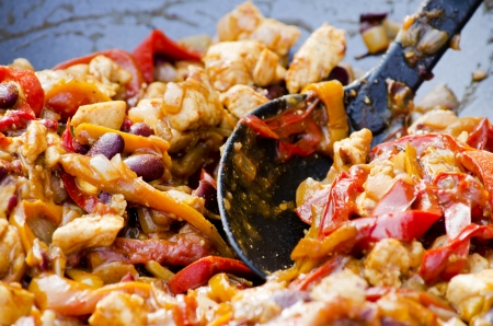 Cooking of vegetables in a frying pan close-upの写真素材