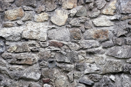 Old wall of gravel and stoneの写真素材