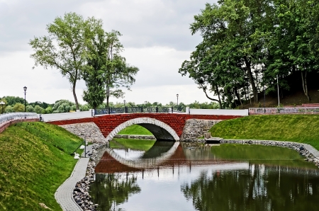 Beautiful stone bridge in the park in Gomel, Belarusの写真素材