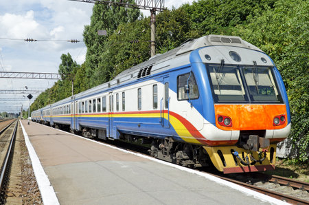  Suburban electric train on the station close up