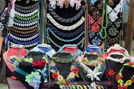 Beaded jewelry on display in the street market for touristsのeditorial素材