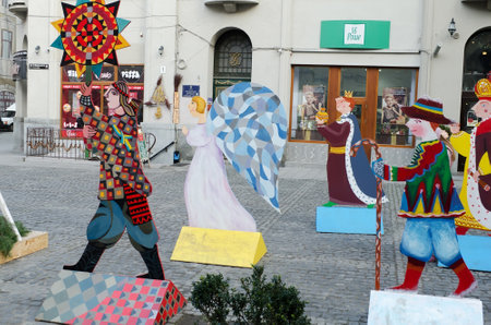 LVOV, UKRAINE - DECEMBER 27: Symbol of Christmas - Characters of Christmas carols, made of plywood, one of the squares in the center of Lvov on December 27, 2013 in Lvov, Ukraineのeditorial素材