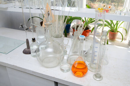 A lot of test tubes and flasks in the chemical laboratoryの写真素材