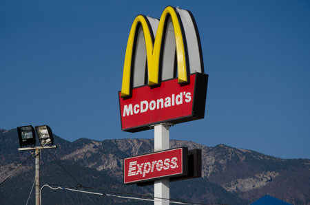 YALTA, CRIMEA, RUSSIA - NOVEMBER 06: The logo on the building of a McDonald's on the promenade in Yalta on November 06, 2014 in Yalta, Crimea, Russiaのeditorial素材