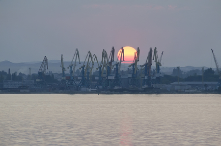 Sea commercial port at sunset in Kerch, Crimea, Russiaの写真素材