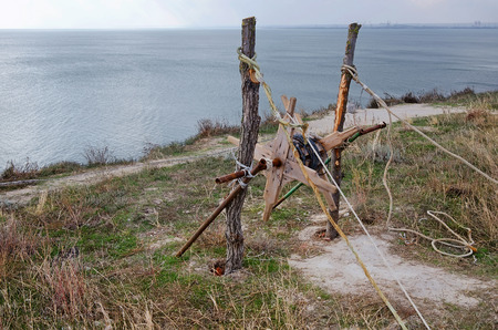 Beautiful seascape - Winch for pulling out of the water fishing nets. Kerch, Crimea