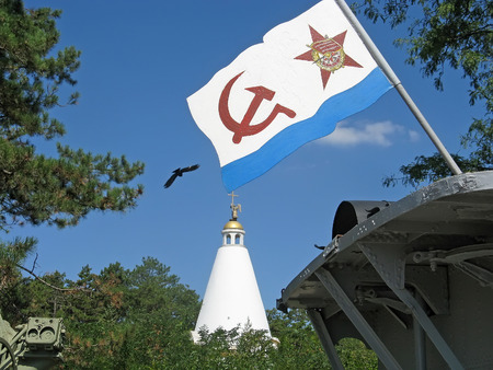 Flag of the Navy of Russia on the background of the chapel on Sapun Mountain in Sevastopol, Crimeaの写真素材