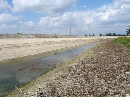 FEODOSIA, CRIMEA, RUSSIA - AUGUST 25: North-Crimean canal without water on august 25, 2014 in Feodosia, Crimea, Russiaの写真素材