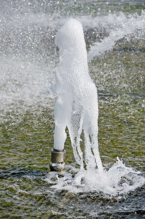 Beautiful landscape - Stream of water in the fountain close-upの写真素材