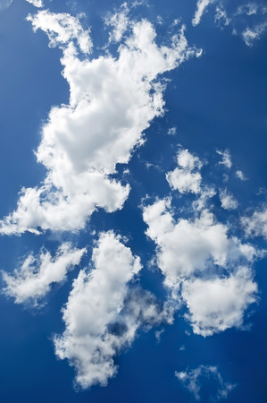 Beautiful backdrop - the puffy cloudsの写真素材