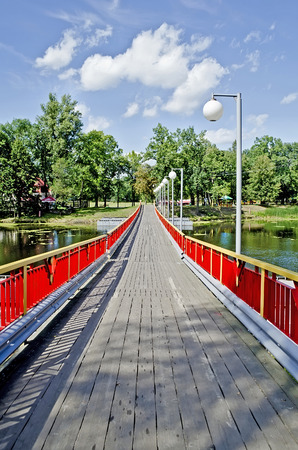 Wooden bridge on the river in perspectiveの写真素材