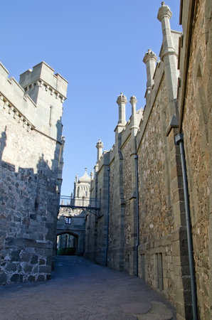 Architectural landmark - Old street in the Vorontsov Palace in Alupka, Yalta, Crimea. Medieval...