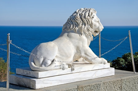 Architectural landmark - Sculpture of a lion of white marble in the Vorontsov Palace in Alupka, Yalta, Crimeaのeditorial素材