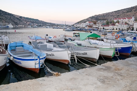 SEVASTOPOL, CRIMEA, RUSSIA - NOVEMBER 04: Many motor Boats at the pier in Balaclava on November 04, 2014 in Sevastopol, Crimea, Russiaのeditorial素材
