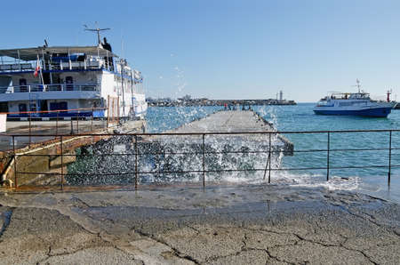 Beautiful seascape - Pleasure boat entering the port of Yalta