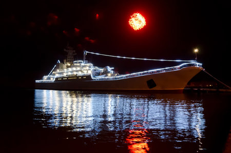 Military Russian ship in the port of Kerch on the background of fireworks in honor of may 9, 2015, Crimeaのeditorial素材