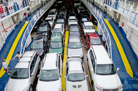 KERCH, CRIMEA, RUSSIA - JUNE 26: Cars and passengers on the ferry in the port of Crimea on June 26, 2015 in Kerch, Crimea, Russiaのeditorial素材