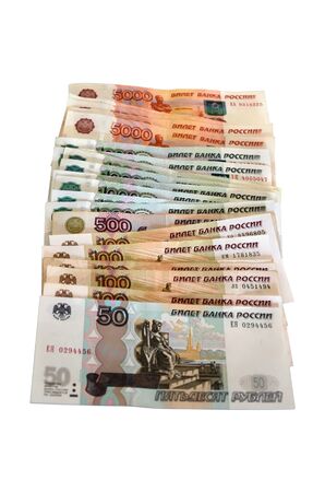 Paper notes of different denominations (Russian rubles), isolated on white backgroundの写真素材