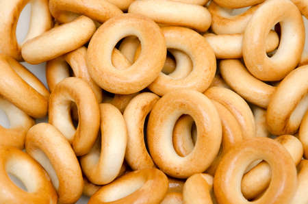 Food background - Delicious fresh bagels closeupの写真素材