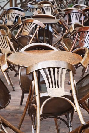 Tables and chairs in empty (nobody) restaurantの写真素材