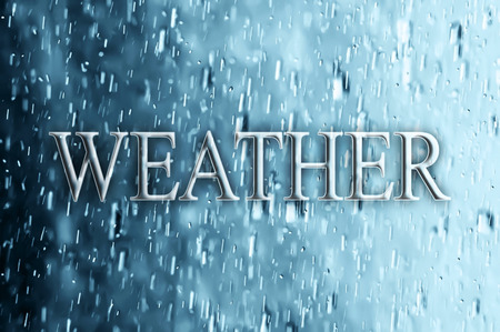 Word weather on the background of spray, drops in motionの写真素材