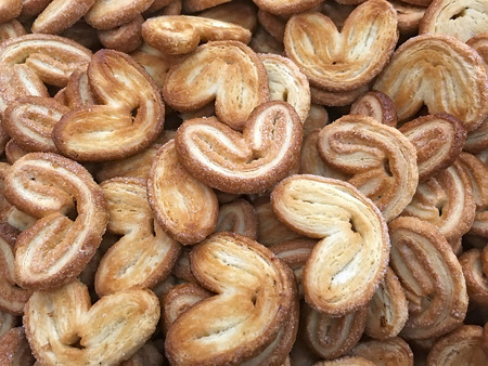 Food background - Cookies in the shape of hearts close-up